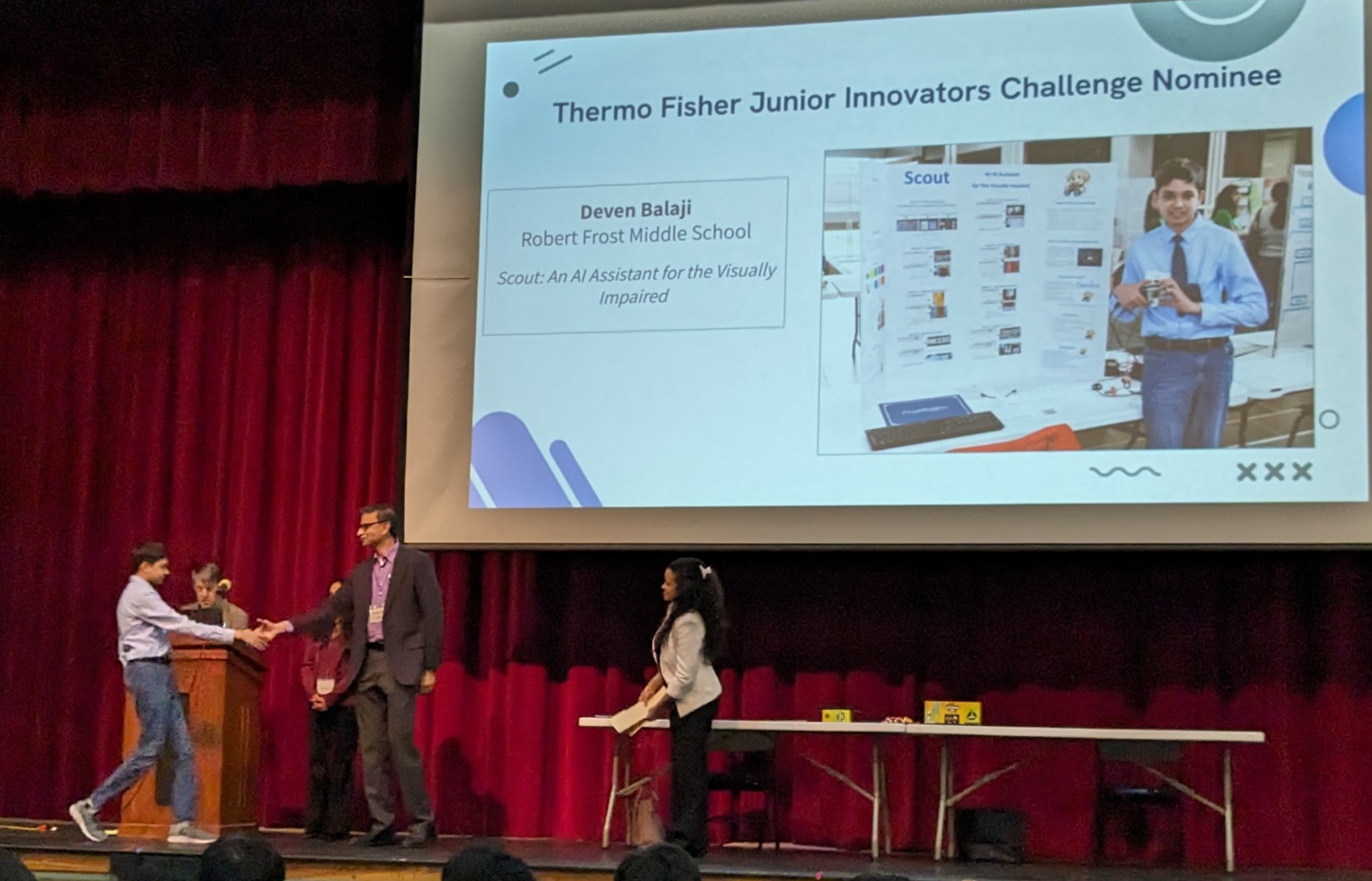 Deven receiving ThermoFisher Junior Innovators Challenge award